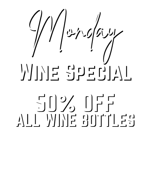 Sign on a black background advertising Monday Wine Special: '50% off all wine bottles', including bubbles.